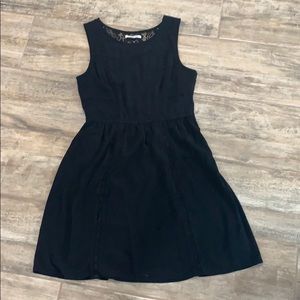 Black dress with lace cutouts
